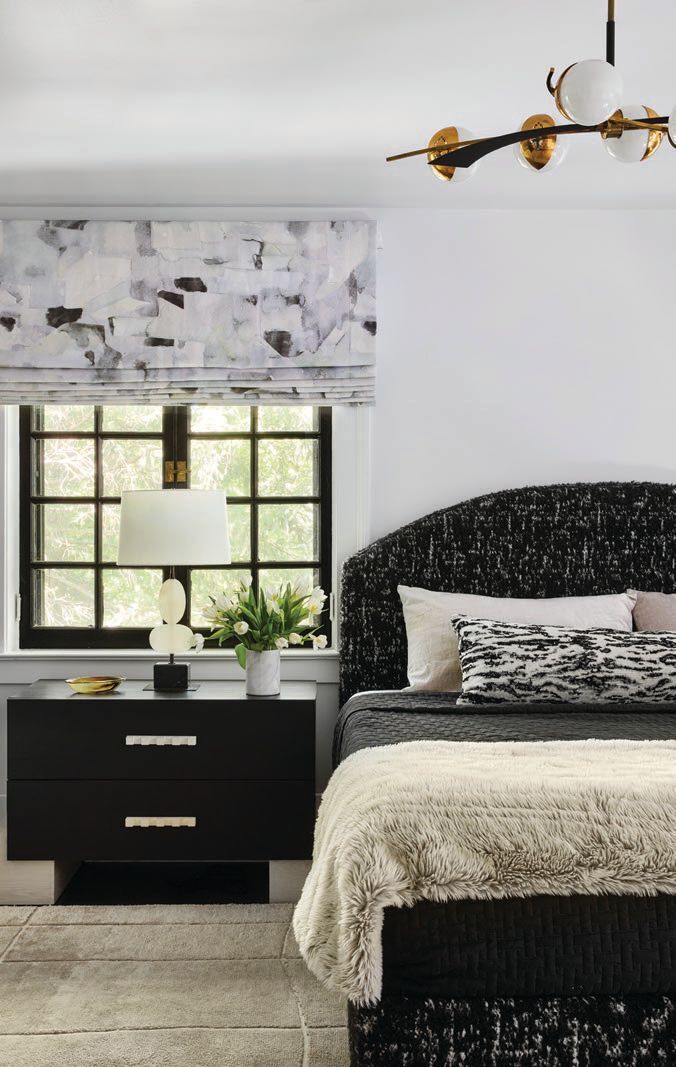 A custom bed with Romo Fabric with Seer Studio nightstands PHOTOGRAPHED BY DUSTIN HALLECK