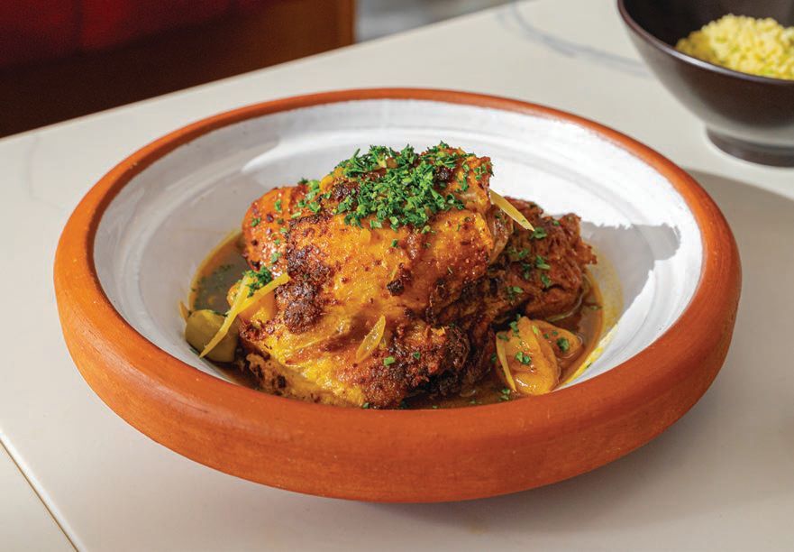 LeTour’s Moroccan influence is expressed in dishes like a tagine of chicken with braised chicken, green olives, apricot, preserved lemon and couscous PHOTO BY KIM KOVACIK