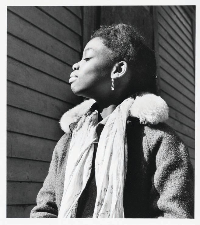 Milton Rogovin, “Girl with Earring” (1961-62, gelatin silver print). MILTON ROGOVIN (AMERICAN, 1909-2011), “GIRL WITH EARRING,” FROM THE SERIES EAST SIDE, BUFFALO, N.Y. (1961-62, GELATIN SILVER PRINT), ORIGINAL SIZE: 7 1/2 INCHES BY 6 3/4 INCHES, THE BLOCK MUSEUM OF ART, THE RICHARD FLORSHEIM ART FUND PURCHASE. 2000.25.16. COPYRIGHT ESTATE OF THE ARTIST. 